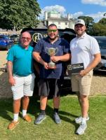 Three members of the winning Golf Team